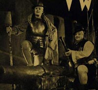 Voskovec a Werich jako žoldnéři v Těžké Barboře. (OD, režie J. Honzl, 1937)